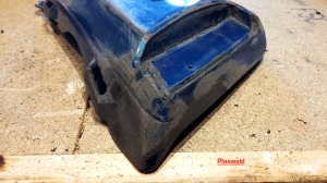 Rebuilt corner with new plastic. Shaped and scraped 